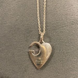 Gucci heart pendant necklace with 15 inch chain.  Never worn.